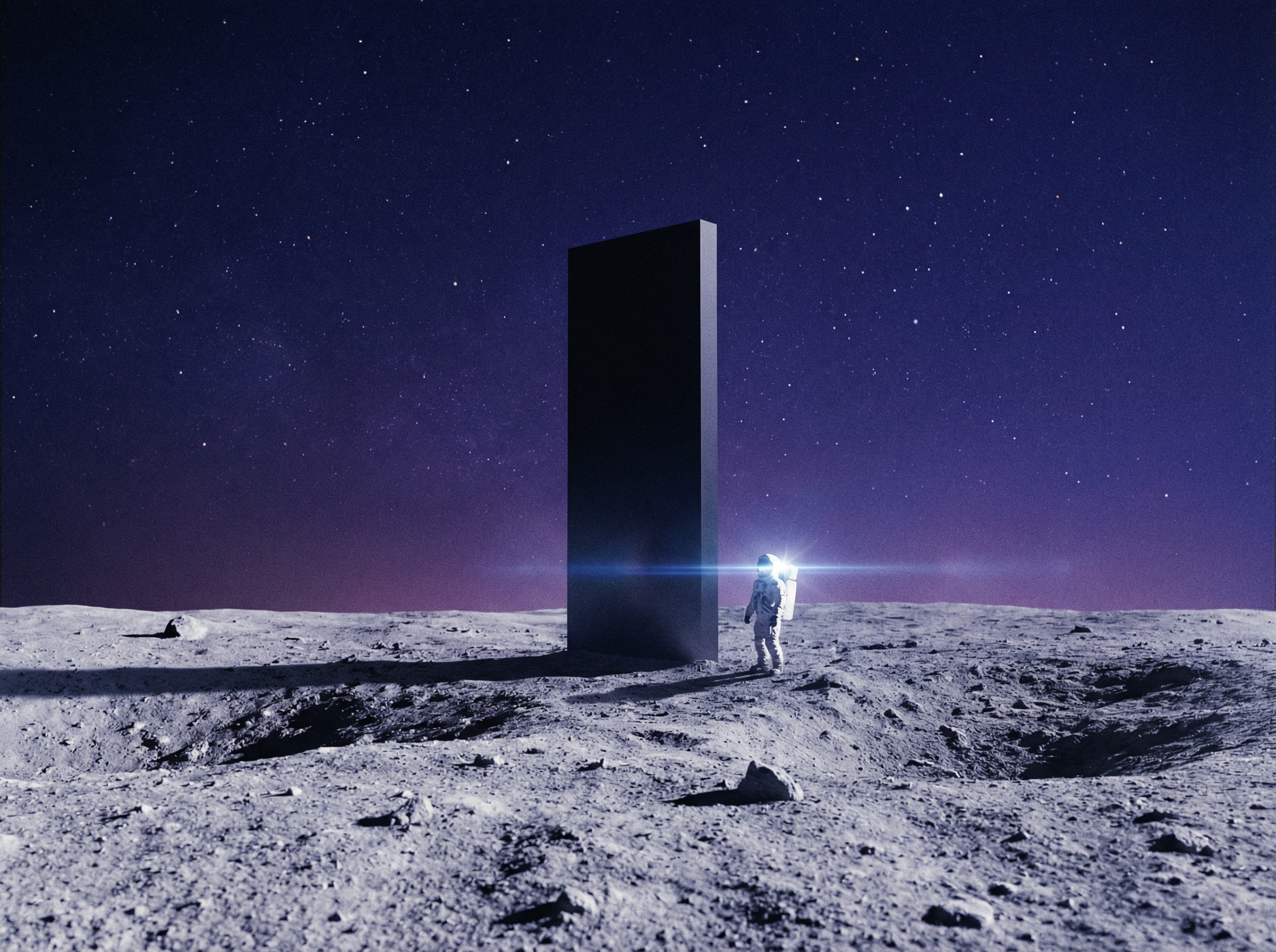 Monolith on lunar surface with astronaut