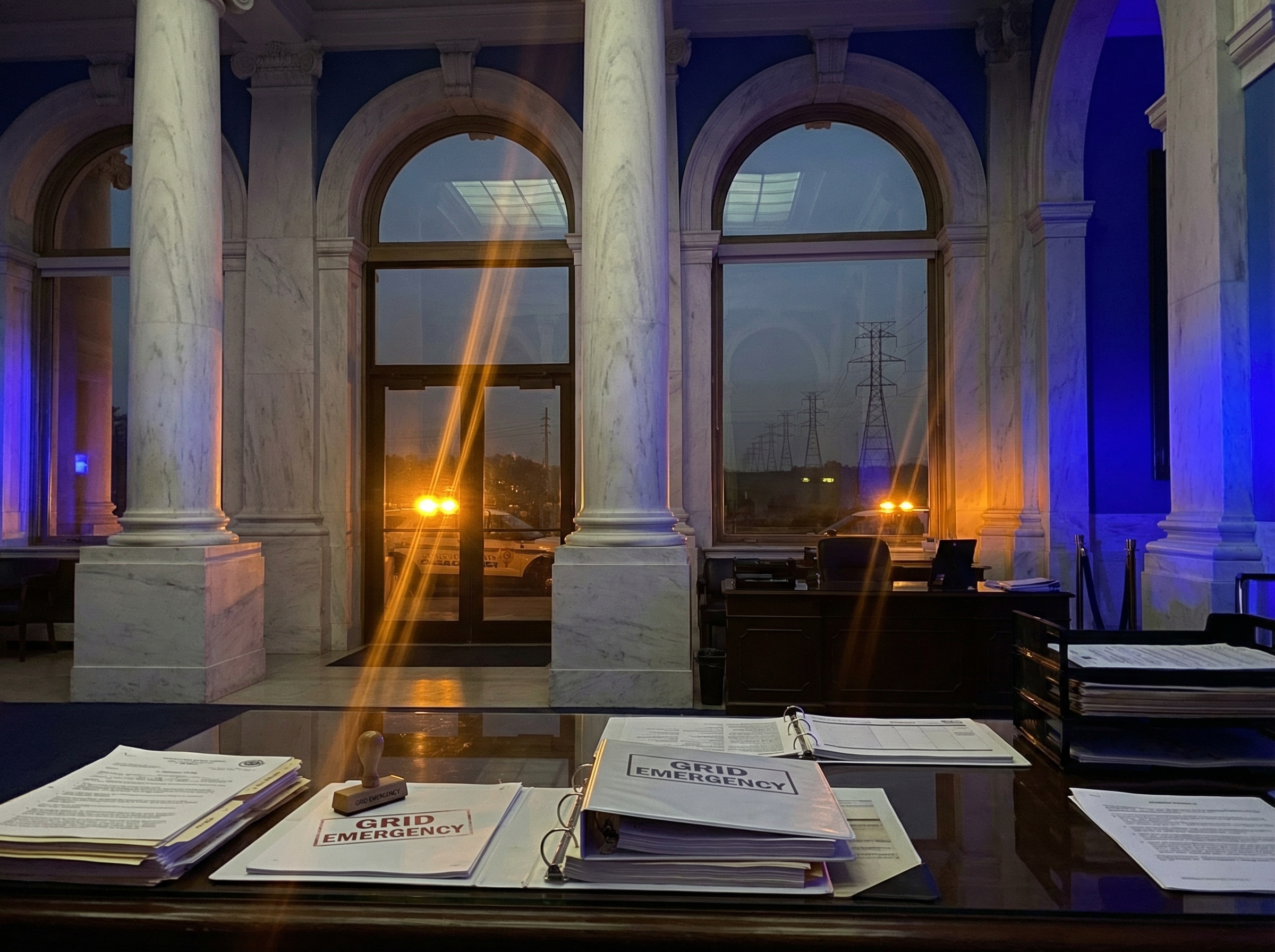 Government building with emergency lights and power grid visible