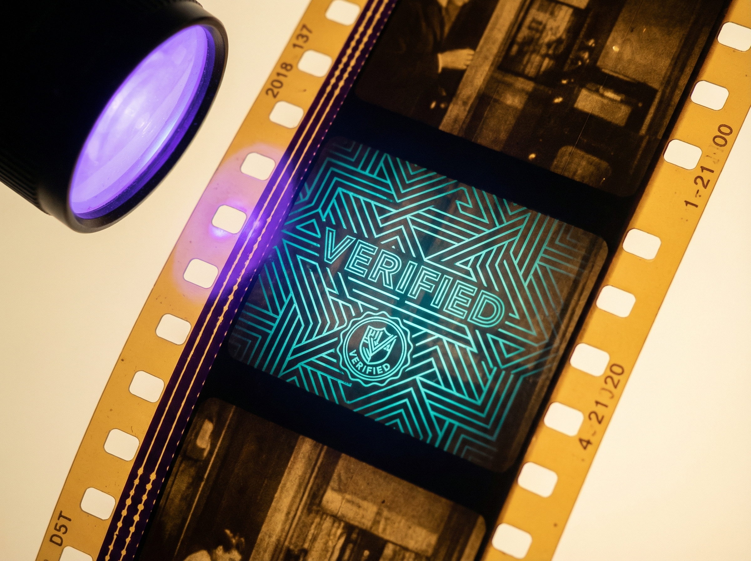 Hidden watermark revealing itself under digital authentication light