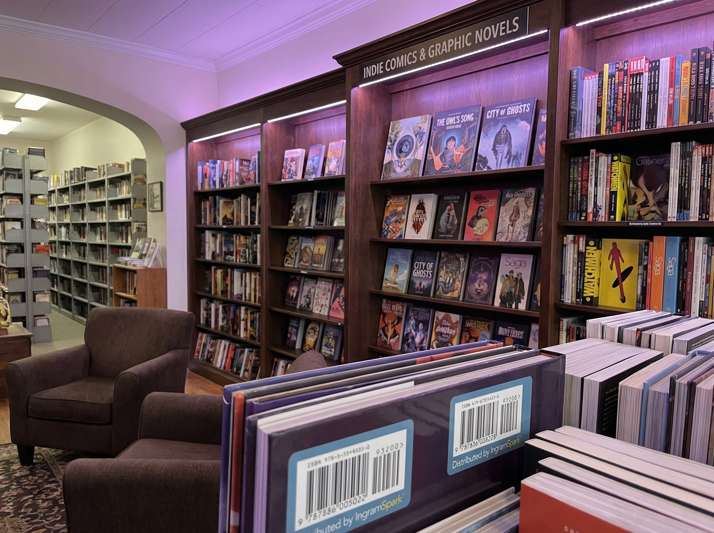 Indie comics displayed on bookstore shelves alongside mainstream titles