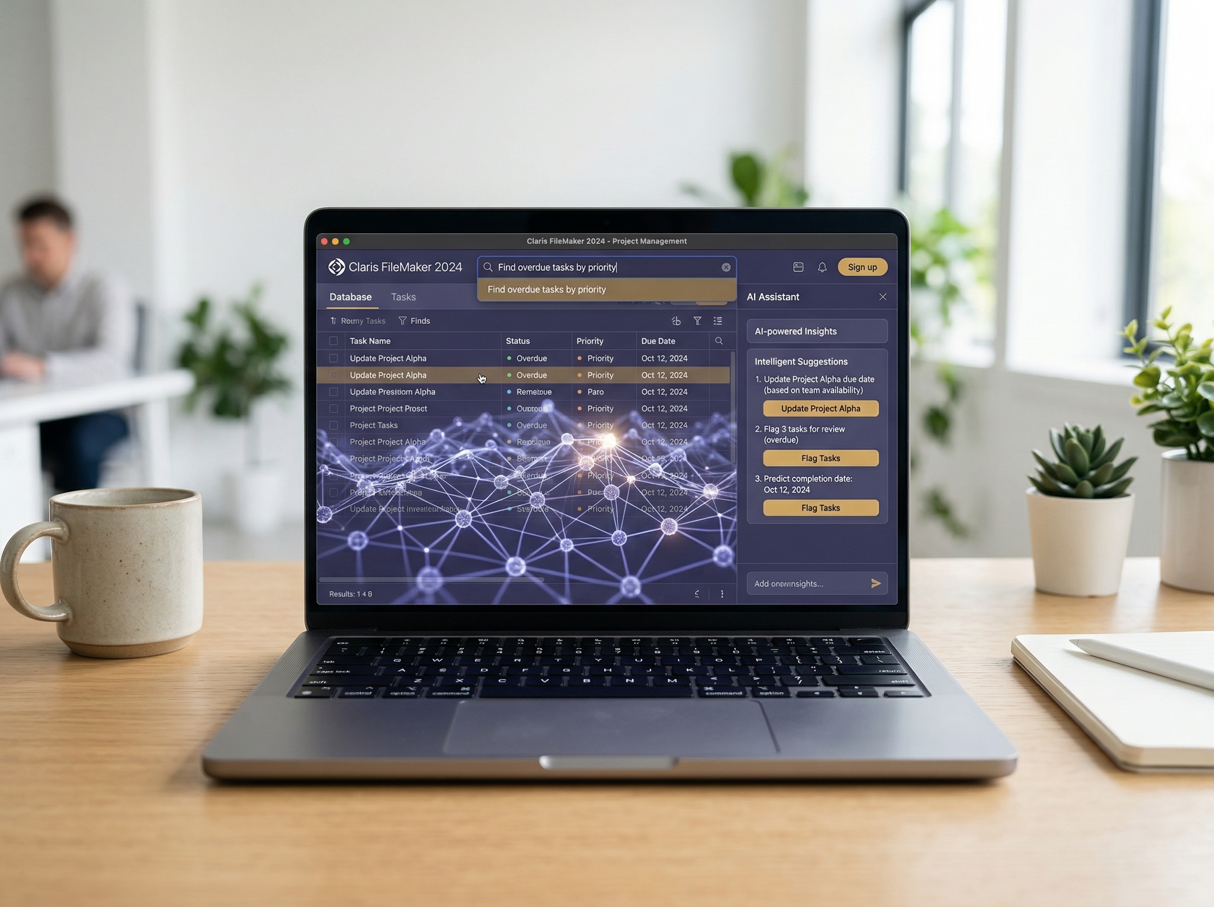 Modern MacBook displaying Claris FileMaker 2024 with AI-powered features